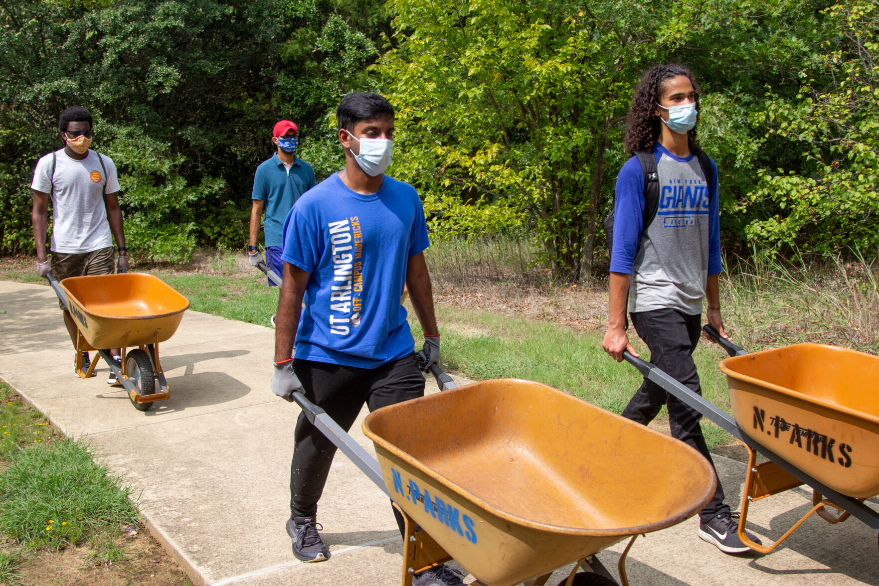 Photos: Volunteers improve trails at O.S. Gray Natural Area for Super Service Saturday